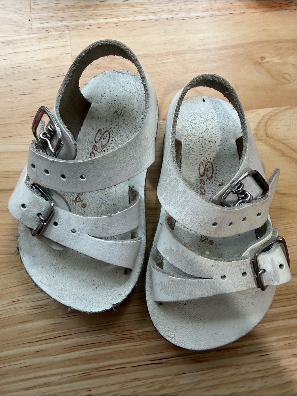 Salt Water Sandals by Hoy baby’s white leather Buckle Sandals
